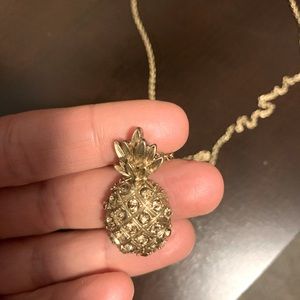 Lilly Pulitzer jeweled pineapple necklace.